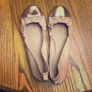 Flats, pink leather material with rose gold toes.